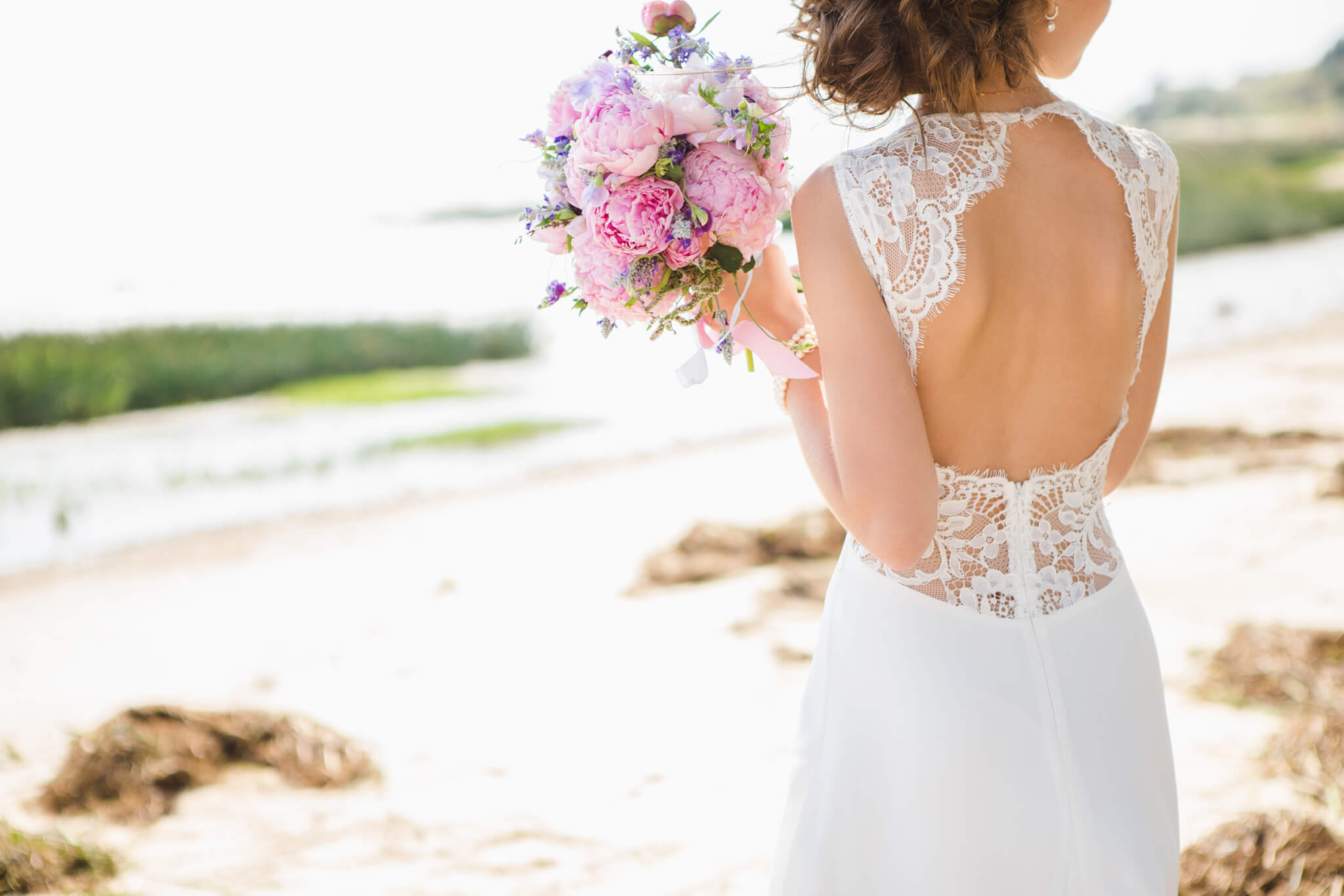 bride holding flowers at her wedding